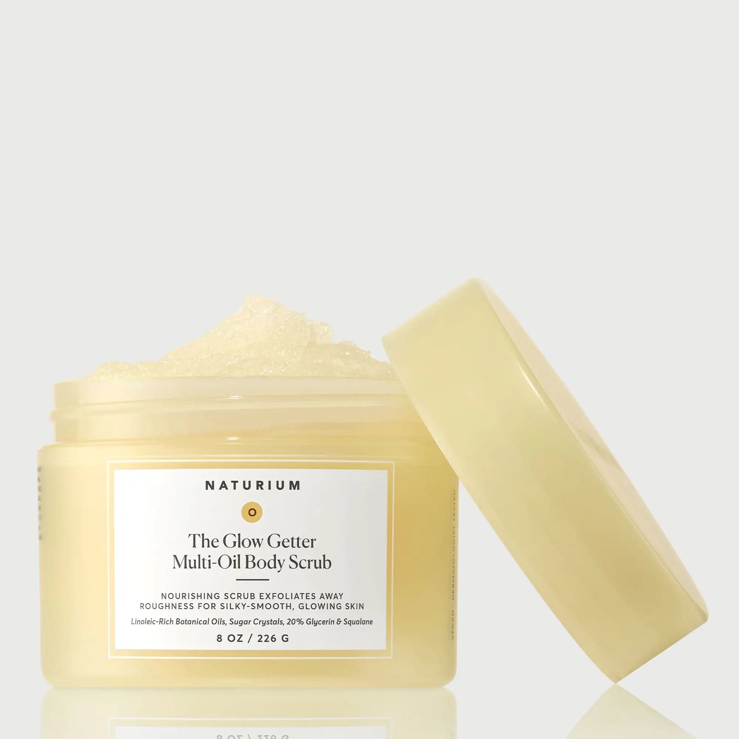 the-glow-getter-multi-oil-body-scrub-i2 NATR-40028-GlowGetter-Multi-Oil-Body-Scrub-Front-CapOff-bonebkgd.webp