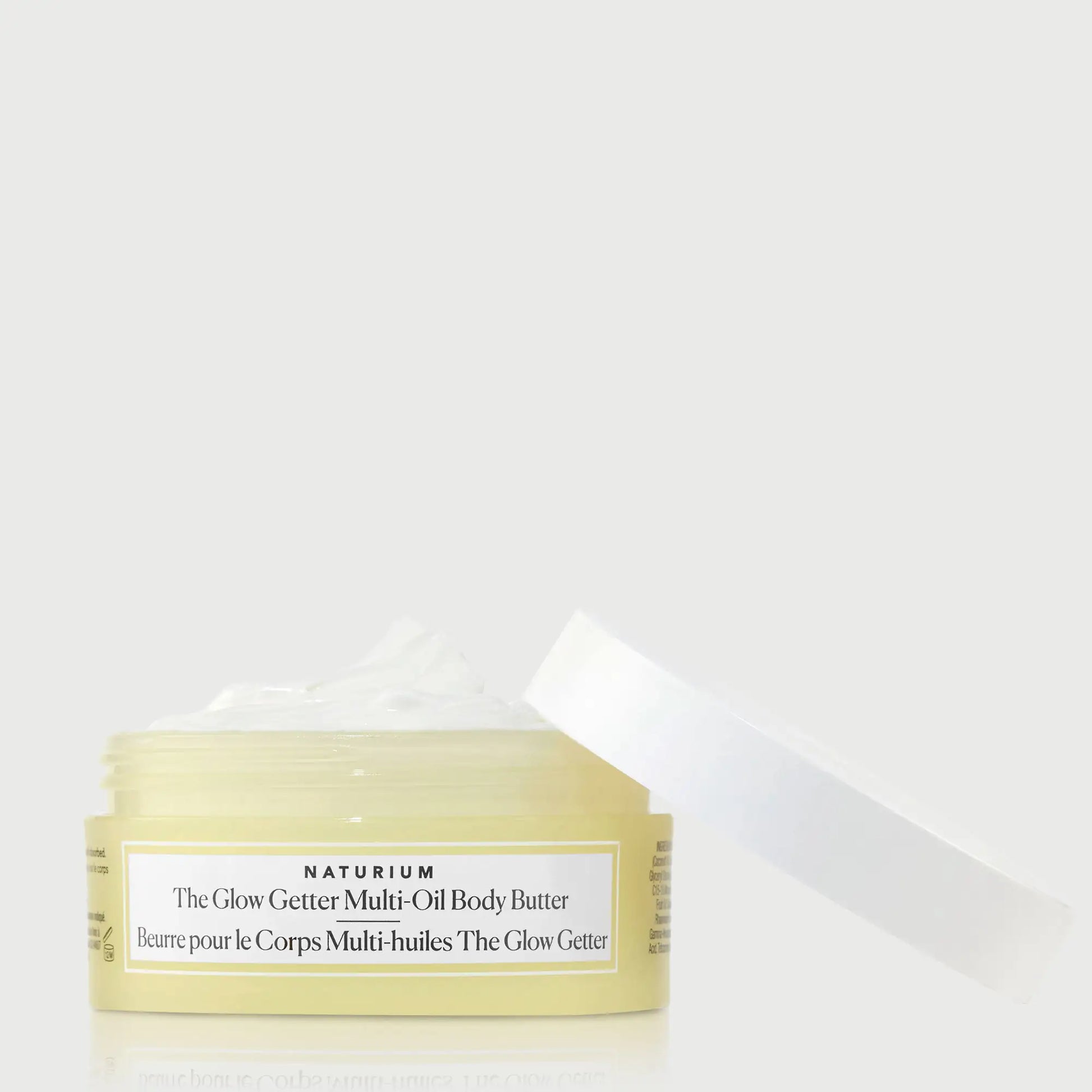 the-glow-getter-multi-oil-body-butter-travel-size-e5 NATR-40115_Glow-Getter-Body-Butter-Mini_front_capoff_bonebkgd.webp