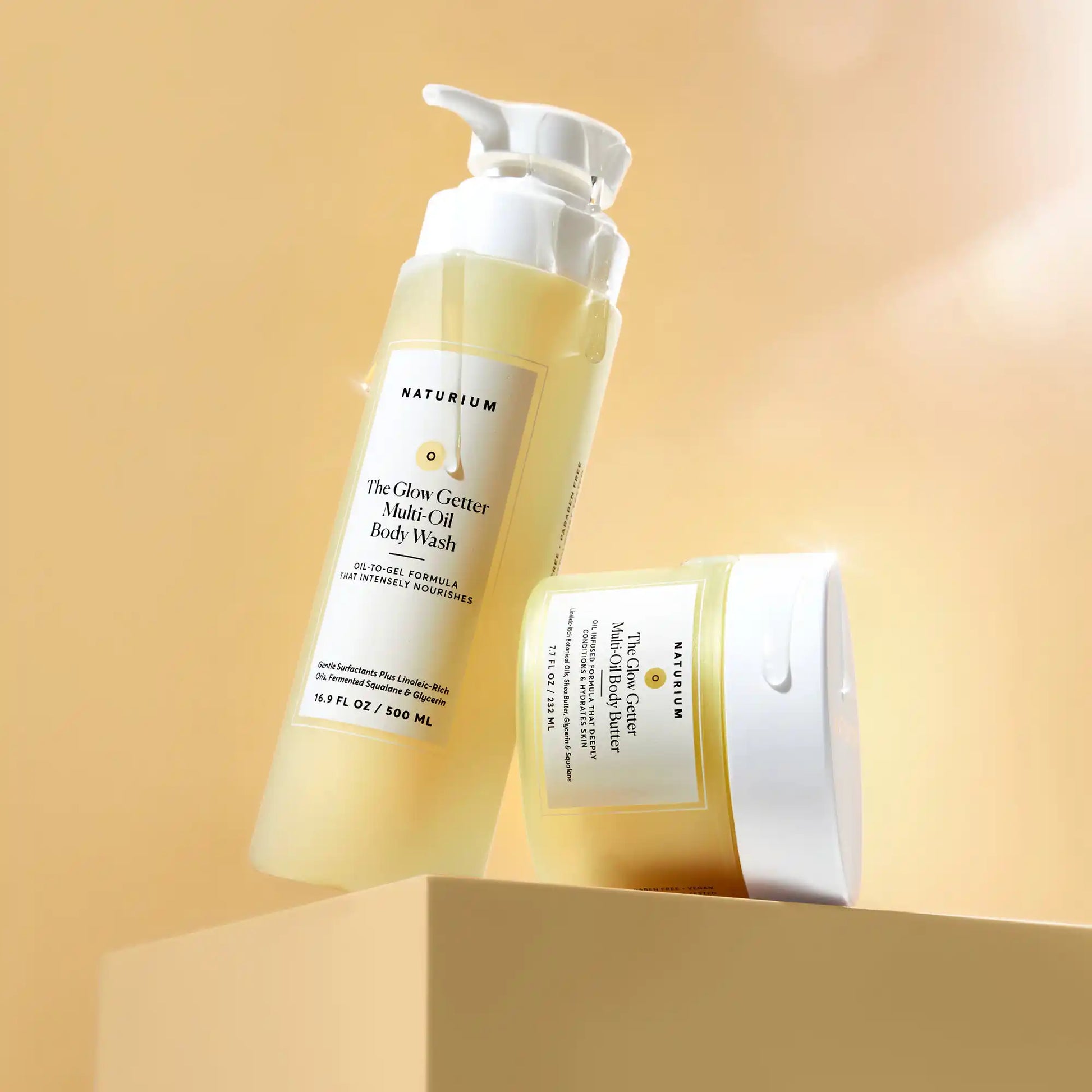 the-glow-all-out-body-bundle-s4 gg-bodybutter_1464-crop_revcolor_FL.webp
